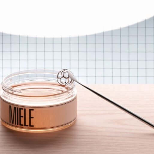 Alessi Honey dipper Hunajalusikka MM128 hunajan kelpuutukseen Miele purkissa, elegantti muotoilu ja kiillotettu teräs.