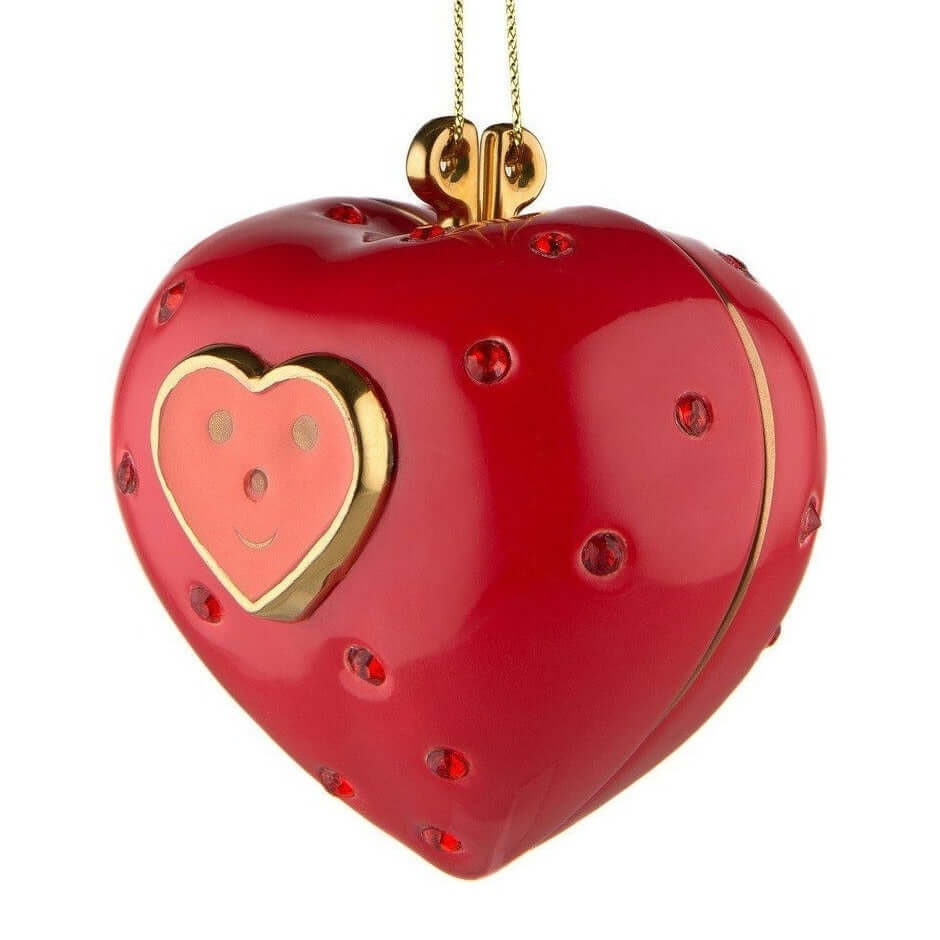 Alessi Faberjori Cuore e Cuora koriste MJ16-11 punainen sydänkoriste kultaisella hymyillä.