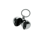 Alessi Bon Bon Coin Holder avaimenperä FA07 avaimenperä, jossa avattava kaksiosainen muoto.