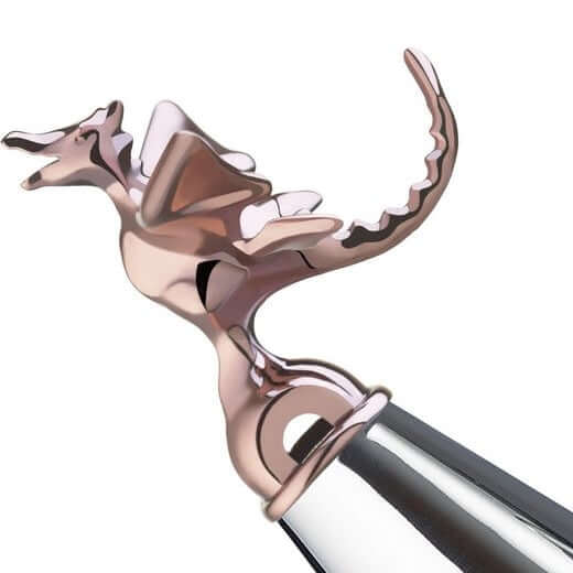 Alessi Tea Rex teepannu 9093REX B:n ruusukullanvärinen lohikäärme viheltävässä teepannussa.