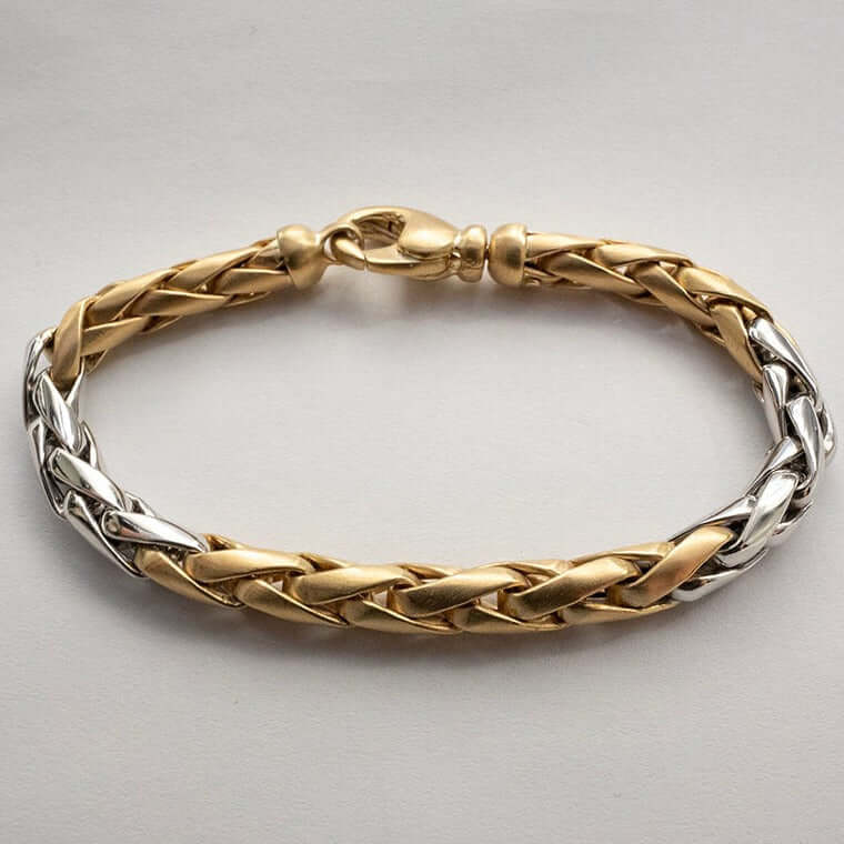 14 karaatin valko- ja keltakultainen ranneketju paino 18g.
