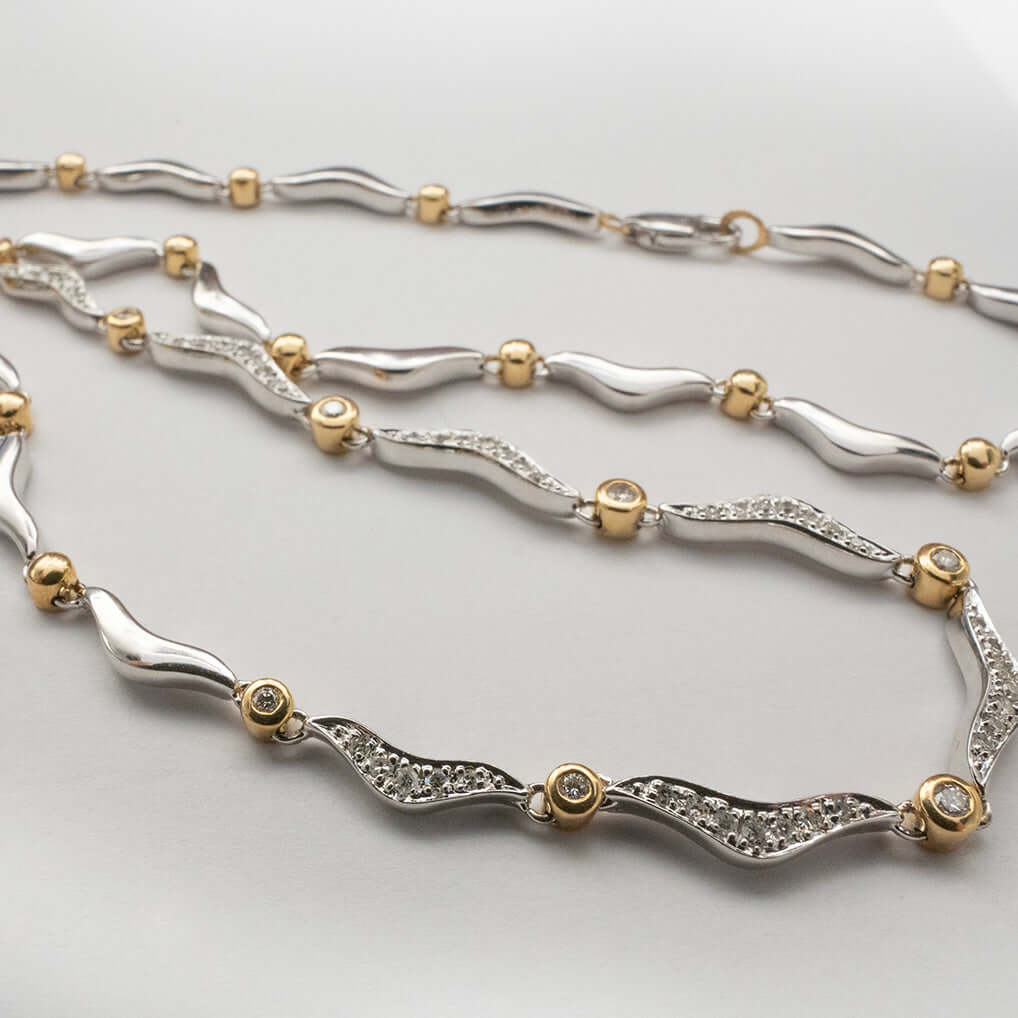 14k valkokultainen kaulakoru timanteilla 061CT