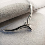 14k valkokultainen timanttiriipus 027ct - 42cm